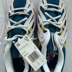 Brand new Adidas 7.5 women’s. Tags and original box.